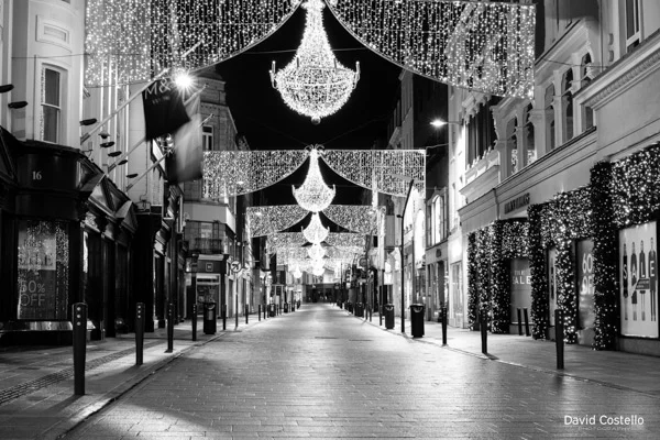 Grafton Street empty and lit up with Christmas decoration on Christmas Night.