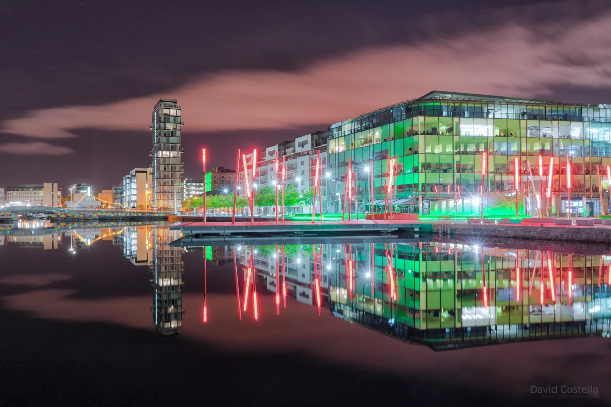 Grand Canal Dock on a beautiful October night as the red light poles and buildings reflected on the mirror like water.