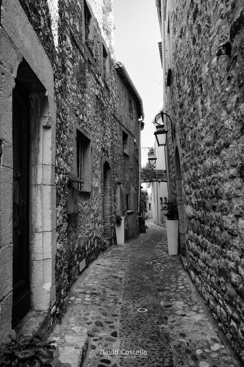 black and white picture of a beautiful cobblestone streets and alleyways of Saint Paul de Vence.