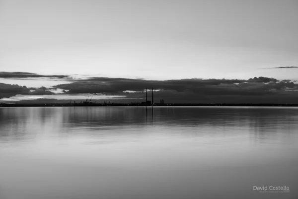 Dublin Bay in black and white on a calm evening.