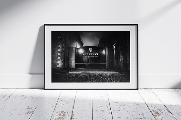 The Guinness Gate in a classic handmade black wooden frame.