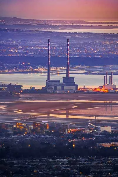 The Poolbeg Chimneys and Dublin Bay from Three Rock Mountain just before sunrise on a Spring morning.
