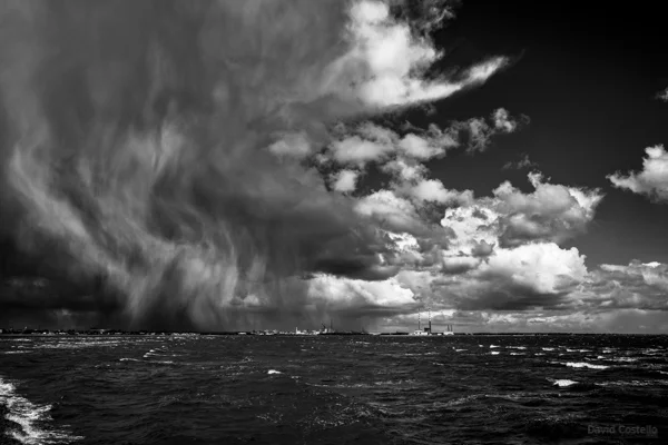 A Spring storm above Dublin bay in a balck and white print.